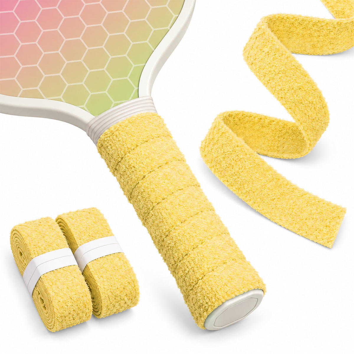 Yellow T1 towel grip tape wrapped on a paddle handle beside two rolls and an extended strip.
