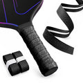 Black R1 perforated overgrip on a paddle handle with two rolls and an extended strip showing its center ridge.