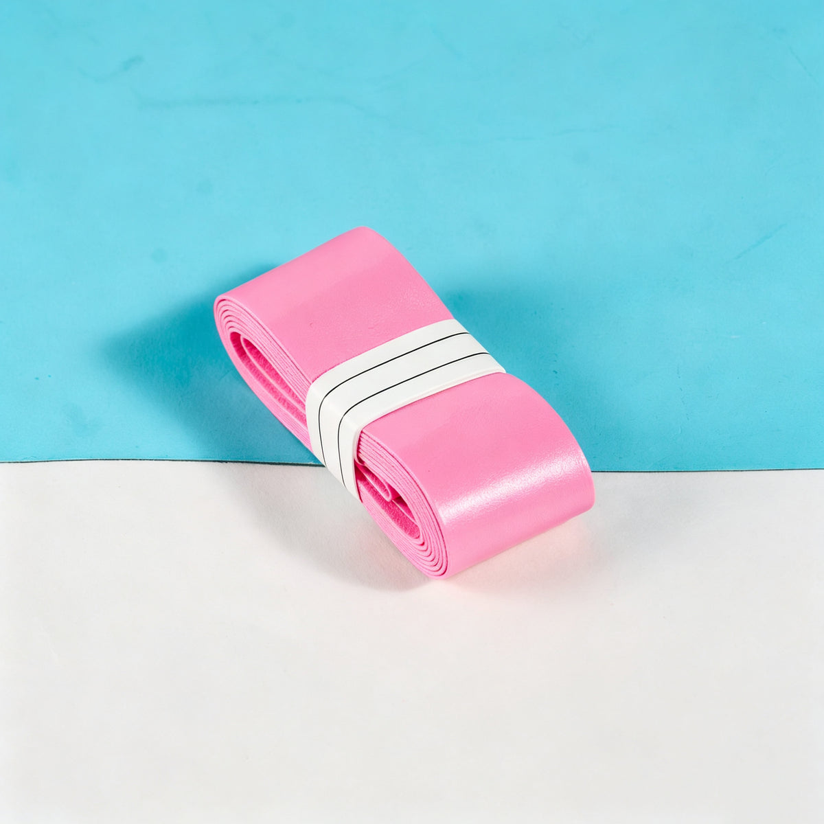 Pink S1 smooth overgrip roll.